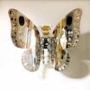 Chelita Zuckermann | FLYING FLOWER - BUTTERFLY. 2023 Original Art. Sculpture. Polished, hammered, and anodized aluminum. Assembled with bolts and rivets. 100x125x32 cm. W. 4 kg. Signed. 