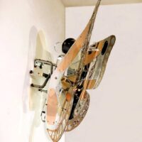 Chelita Zuckermann | FLYING FLOWER - BUTTERFLY. 2023 Original Art. Sculpture. Polished, hammered, and anodized aluminum. Assembled with bolts and rivets. 100x125x32 cm. W. 4 kg. Signed. 